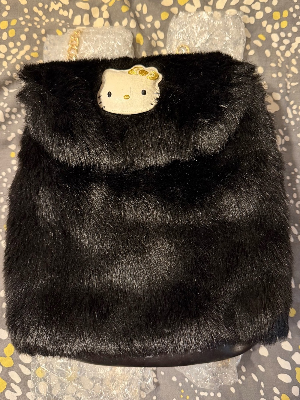 Hello Kitty Black Faux Fur Shoulder Bag with Gold Bow Accent
